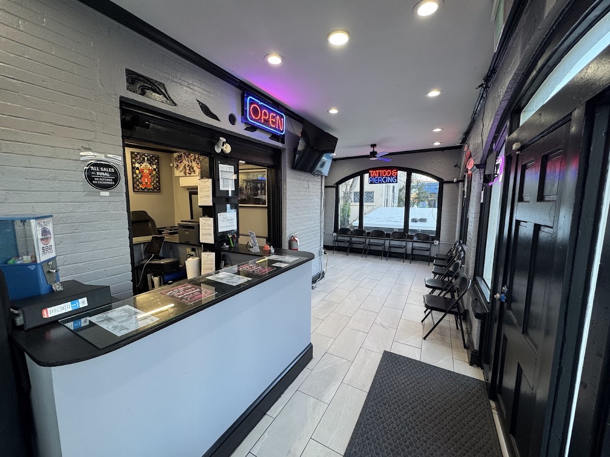 Clean front counter and waiting area inside Long Island Ink